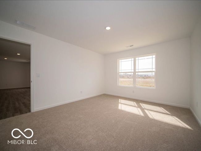 carpeted spare room featuring visible vents, recessed lighting, and baseboards | Image 28