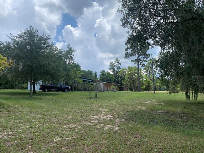 24645 Ne 177 Th Ter, House other with 2 bedrooms, 1 bathrooms and null parking in Fort Mc Coy FL | Image 68