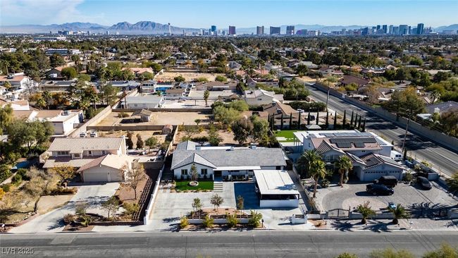 Aerial view featuring a mountain view and a view of city | Image 39