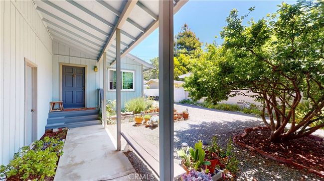 entrance from gate at front of house | Image 18