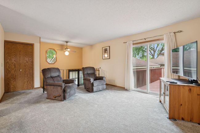 The living room features new carpet and pad! | Image 4