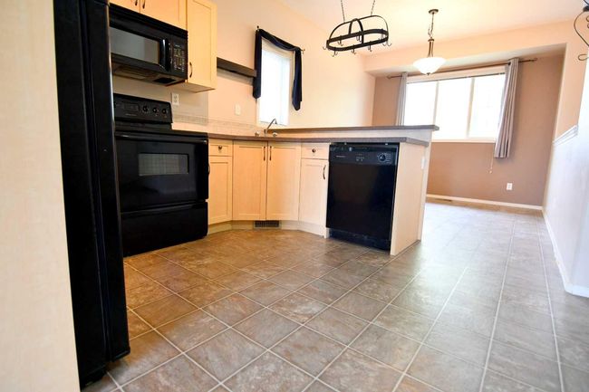 49 Prairie Ridge Close, Townhouse with 2 bedrooms, 2 bathrooms and 3 parking in Blackfalds AB | Image 10