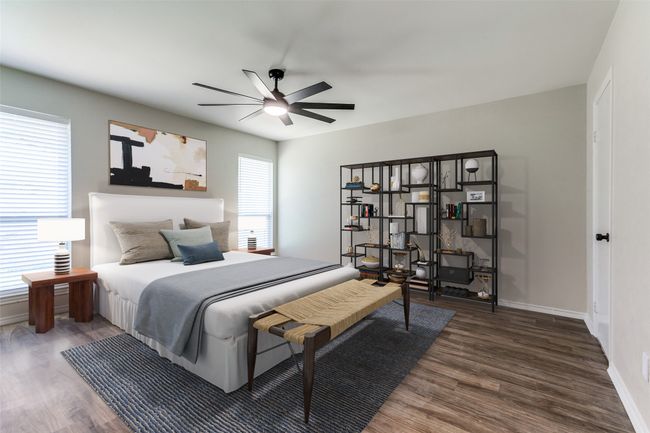 Bedroom featuring wood finished floors and a ceiling fan | Image 5