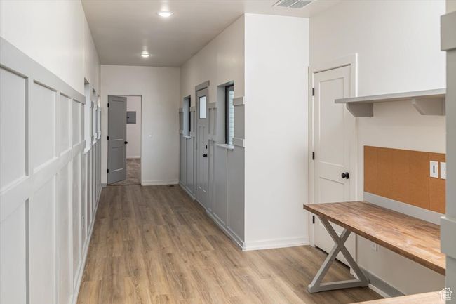 Hall featuring light hardwood / wood-style floors | Image 33