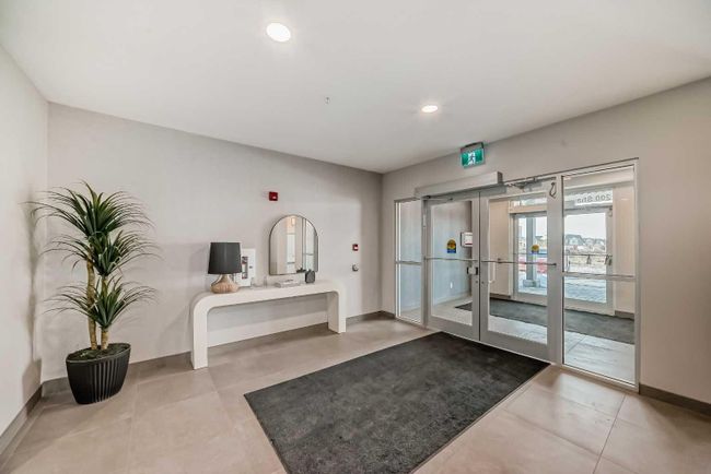 405 - 200 Shawnee Square Sw, Home with 2 bedrooms, 2 bathrooms and 1 parking in Calgary AB | Image 3