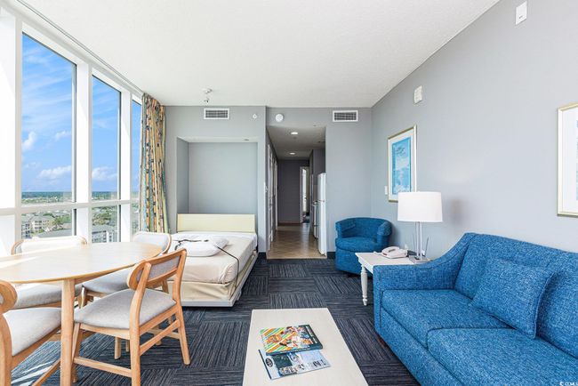 View of living area | Image 8