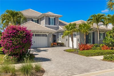 View of front facade featuring a garage | Image 1