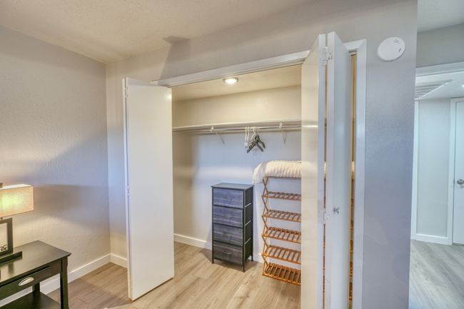View of closet bedroom lower unit | Image 9