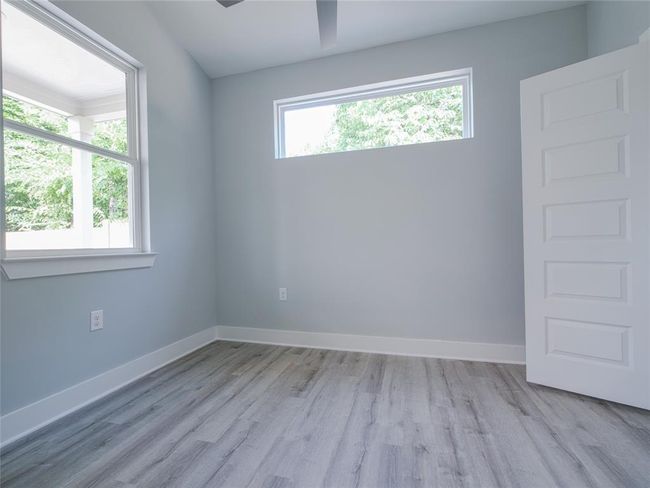 Unfurnished room with light wood finished floors | Image 11