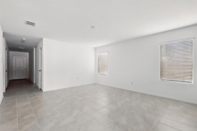 Living Room with baseboards, visible vents, and light tile patterned floors | Image 12