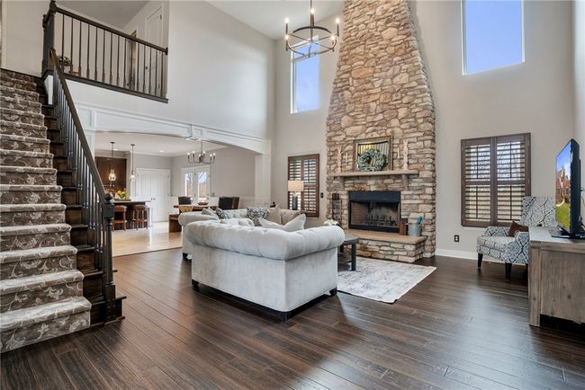Grand family room with 2 story cathedral ceiling | Image 4