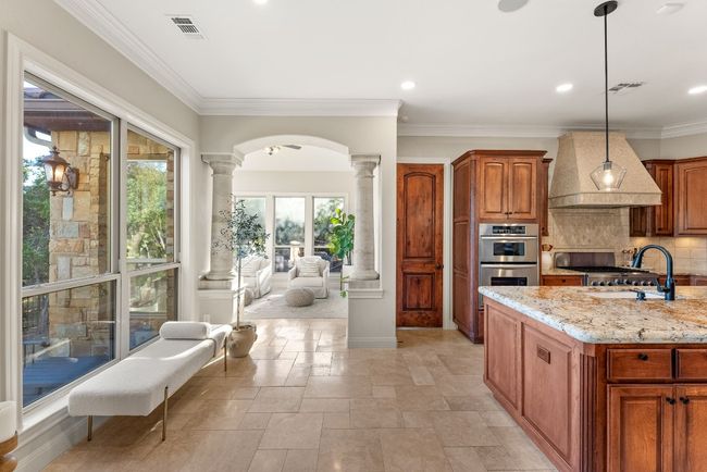 There's so much light that comes through the home with all of the windows. | Image 11