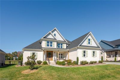 7403 Harkwood Court, House other with 4 bedrooms, 3 bathrooms and null parking in Oak Ridge NC | Image 2