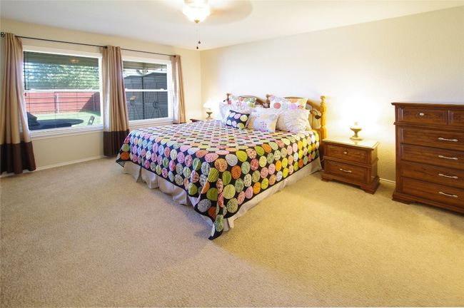 Primary bedroom is on the main level far from the other 3 bedrooms | Image 11