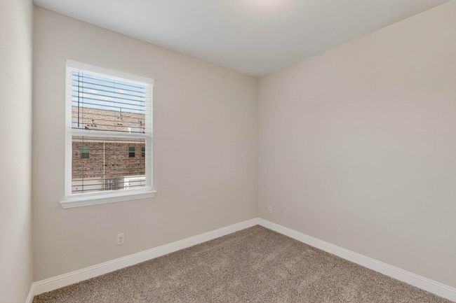 Spare room with carpet floors and baseboards | Image 28