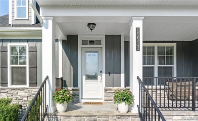 View of exterior entry featuring covered porch | Image 3