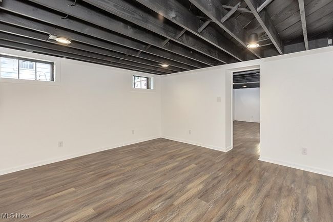 Basement featuring hardwood / wood-style floors | Image 43