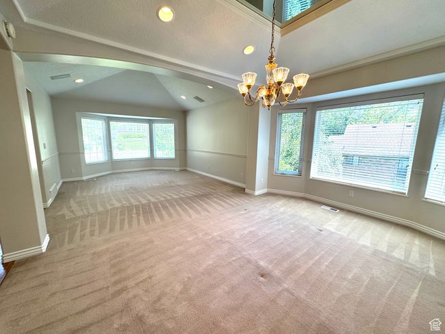 View of living room with bay window. | Image 6