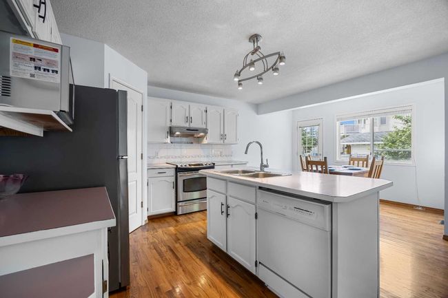 240 Arbour Ridge Way Nw, House other with 6 bedrooms, 4 bathrooms and 4 parking in Calgary AB | Image 9