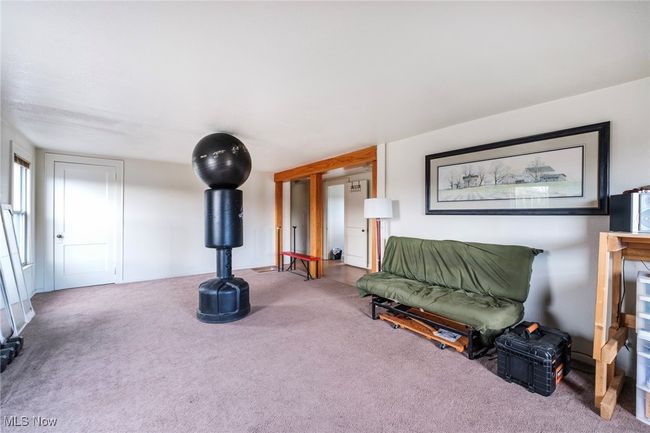 View of carpeted living area | Image 28