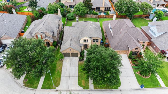 Large driveway and garage space for all of your vehicles. | Image 40