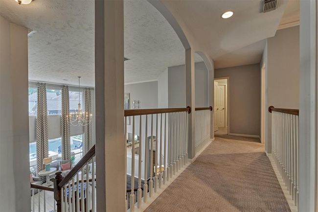 Walk way to additional two (2) Bedrooms and Gameroom. | Image 31