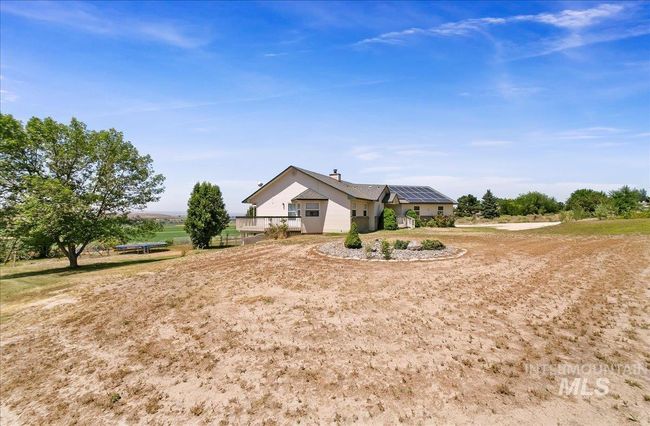 View of front of home featuring a chimney | Image 46