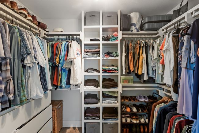 Primary bedroom closet with custom built-ins to maximize storage. | Image 28