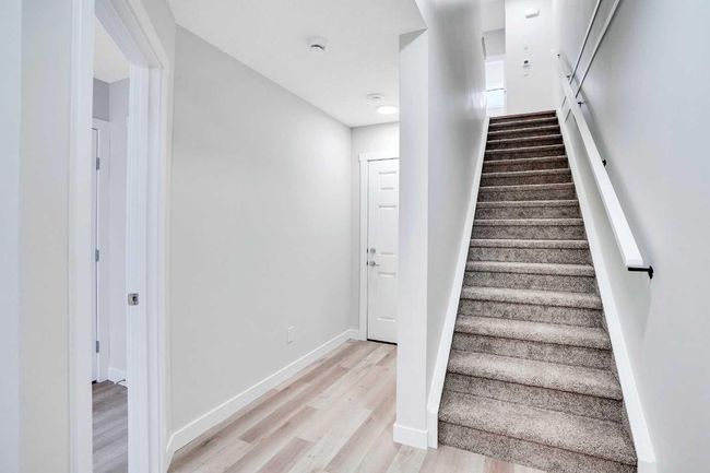 306 Red Sky Villas Ne, Townhouse with 3 bedrooms, 4 bathrooms and 1 parking in Calgary AB | Image 4