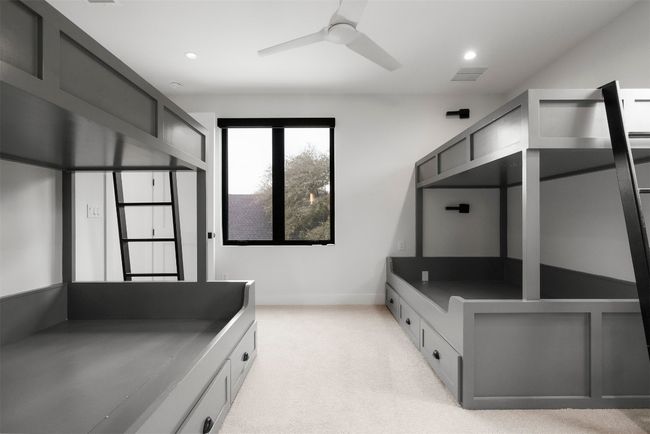 A secondary bedroom transforms into an imaginative hideaway with built-in double bunk beds—perfect for adventure-filled nights | Image 26