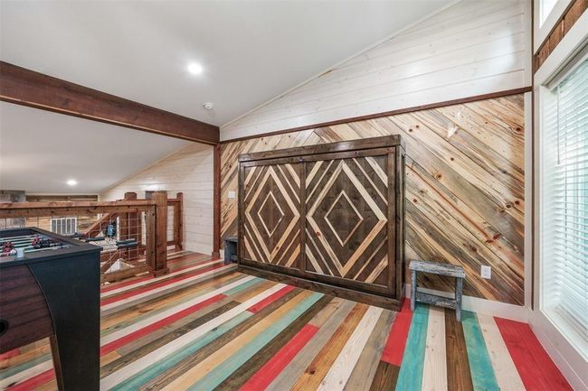game room with murphy beds | Image 10