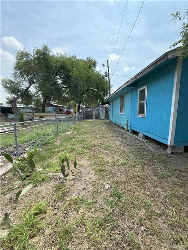 View of yard featuring fence | Image 27
