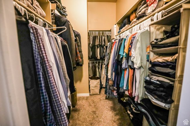Walk in closet featuring carpet floors | Image 27