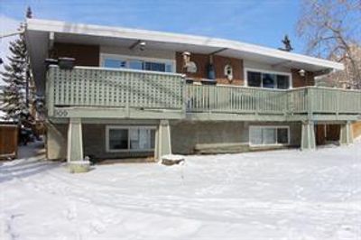 909 34a St Nw, Home with 4 bedrooms, 2 bathrooms and 3 parking in Calgary AB | Image 1