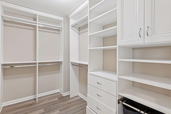Primary custom walk-in closet | Image 26
