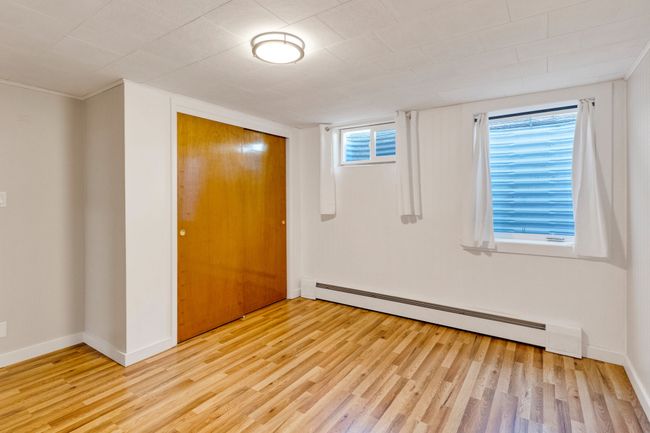 Doorway with wood finished floors and baseboards | Image 29
