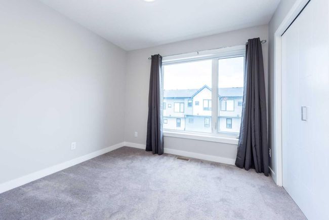 213 Evanscrest Sq Nw, Townhouse with 2 bedrooms, 3 bathrooms and 2 parking in Calgary AB | Image 26