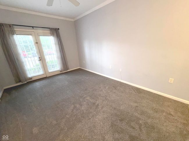Living Room with new carpeting and Ceiling Fan | Image 4