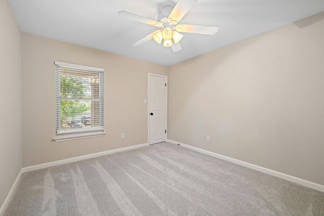 Spacious closets offer practical storage for clothing, toys, or home office needs. | Image 30