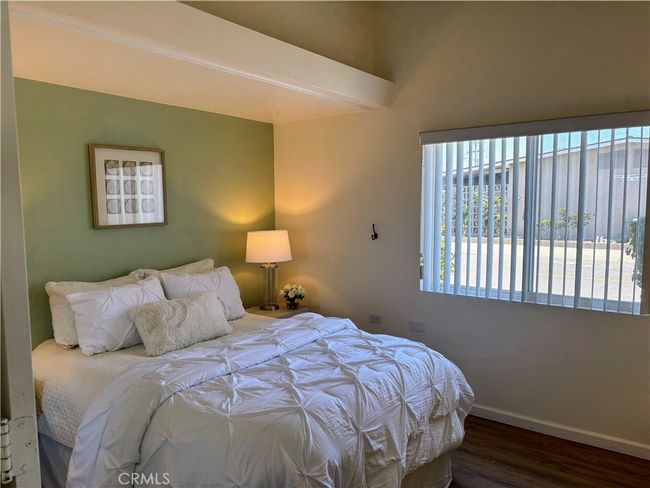 Secondary Bedroom With Mirrored Closet Doors | Image 15
