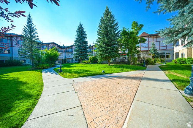 View of community with a lawn | Image 46
