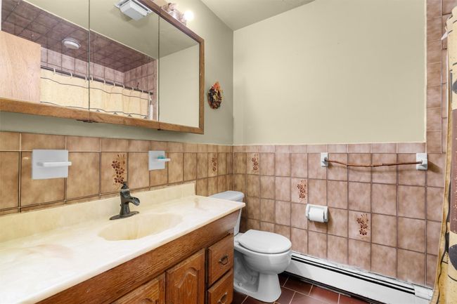 Full bathroom with bath tub | Image 16