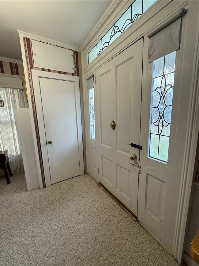 Foyer entrance featuring ornamental molding | Image 22