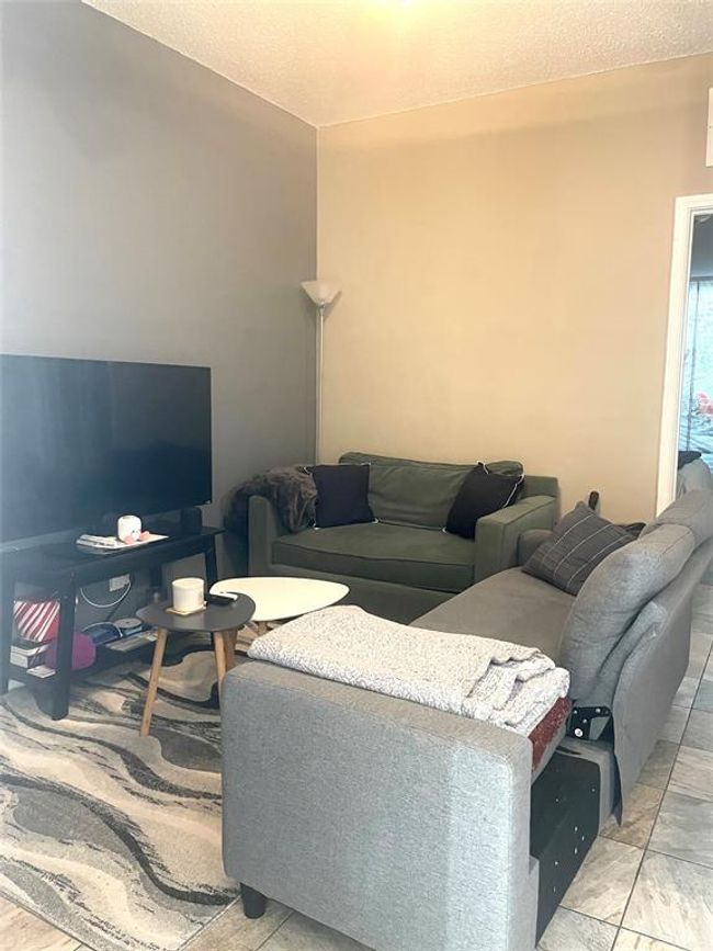View of living area | Image 18