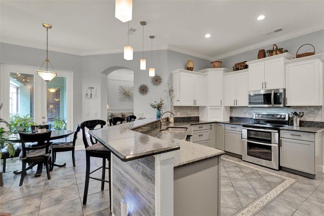 Renovated Kitchen & Breakfast Room with Upscale Finishes | Image 8