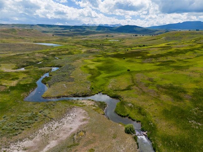Drone / aerial view with a water and mountain view | Image 39