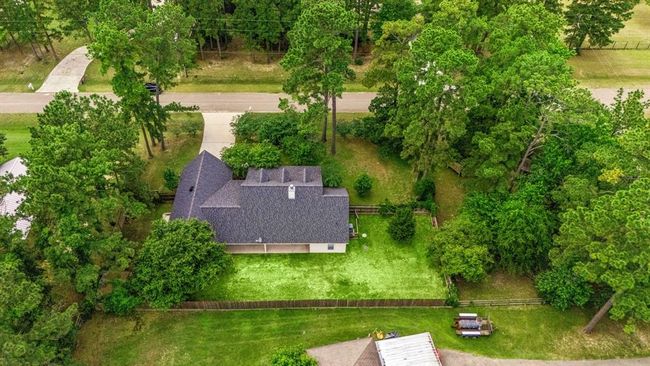 Aerial view of the home that demonstrates the new roof with transferrable warranty. | Image 38