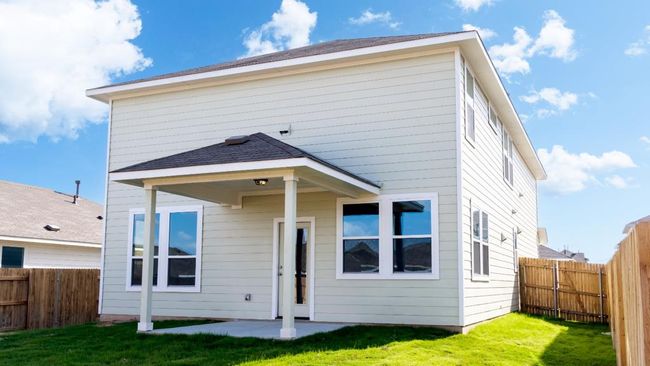 Rear view of property featuring a fenced backyard and a patio | Image 29