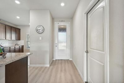 Doorway featuring light hardwood / wood-style flooring | Image 3