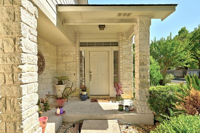 Doorway to property with stone siding | Image 4